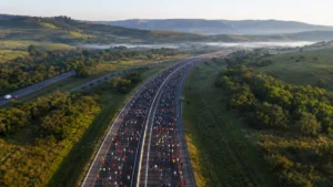 Comrades Marathon fleet routes — runners on the N3 highway between Durban and Pietermaritzburg